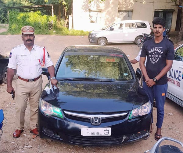 ಪೊಲೀಸ್ ಸ್ಟಿಕ್ಕರ್ ಅಂಟಿಸಿಕೊಂಡು ಸಿಕ್ಕಿಬಿದ್ದ ಐನಾತಿ..!