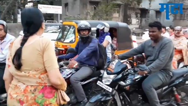 ಫುಟ್ಪಾತ್ ಮೇಲೆ ಬೈಕ್ ಓಡಿಸುತ್ತಿದ್ದವರನ್ನು ಬೆಂಡ್ ಎತ್ತಿದ ದಿಟ್ಟ ಮಹಿಳೆ..!