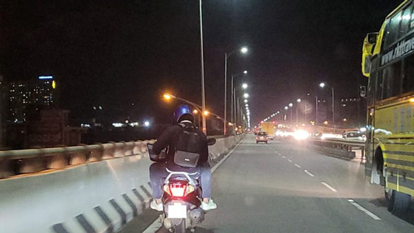 ಕೆಲಸದ ಒತ್ತಡ: ಬೈಕ್ ಚಾಲನೆ ವೇಳೆಯೂ ಲ್ಯಾಪ್ಟಾಪ್ ಬಳಸಿ ವೈರಲ್ ಆದ ವ್ಯಕ್ತಿ